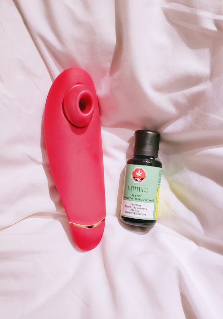 Womanizer vibrator with Sex Pot intimacy oil by Latitude
